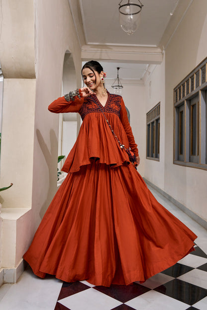 Designed for &nbsp;Pure Cotton, this graceful lehenga features intricate Kashida and gamthi Work on the top, paired with a charming matching Purse for a complete festive look.