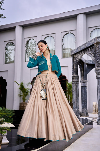 Designed for &nbsp;Pure Cotton, this graceful lehenga features intricate Kashida and gamthi Work on the top, paired with a charming matching Purse for a complete festive look.