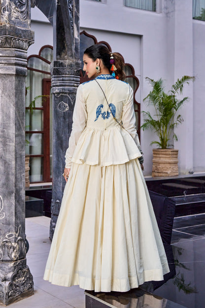 Designed for &nbsp;Pure Cotton, this graceful lehenga features intricate Kashida and gamthi Work on the top, paired with a charming matching Purse for a complete festive look.