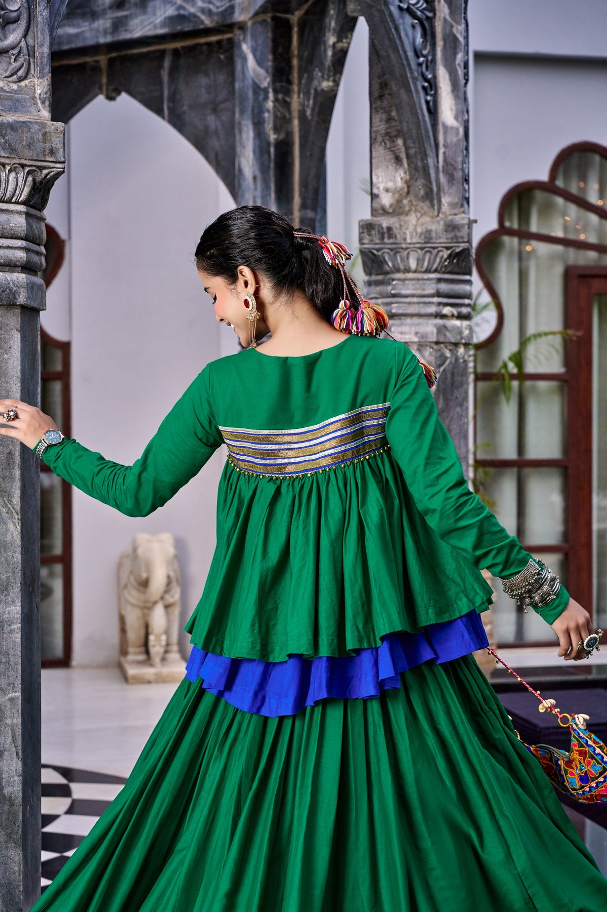 Designed for &nbsp;Pure Cotton, this graceful lehenga features intricate Kashida and gamthi Work on the top, paired with a charming matching Purse for a complete festive look.
