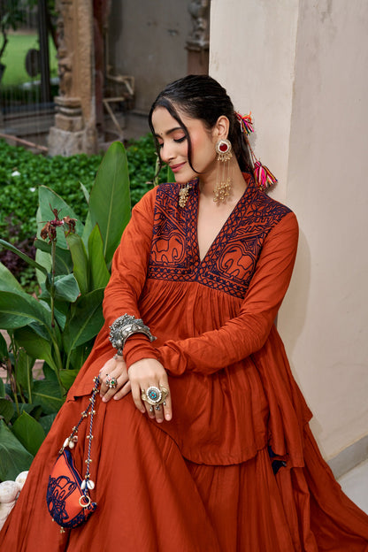 Designed for &nbsp;Pure Cotton, this graceful lehenga features intricate Kashida and gamthi Work on the top, paired with a charming matching Purse for a complete festive look.