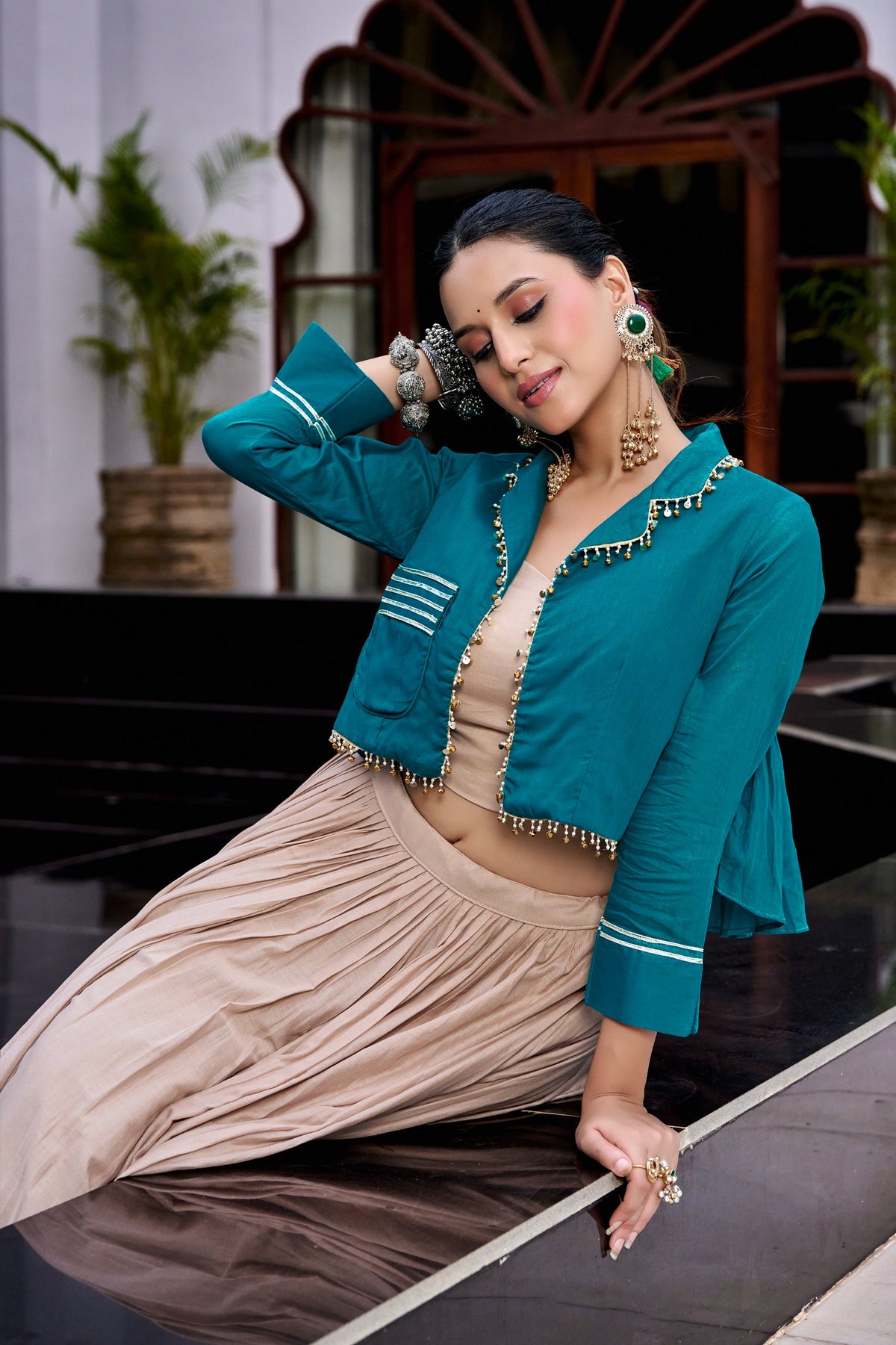 Designed for &nbsp;Pure Cotton, this graceful lehenga features intricate Kashida and gamthi Work on the top, paired with a charming matching Purse for a complete festive look.