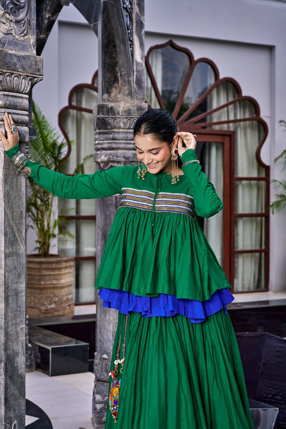 Designed for &nbsp;Pure Cotton, this graceful lehenga features intricate Kashida and gamthi Work on the top, paired with a charming matching Purse for a complete festive look.
