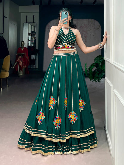 Lightweight fabric with vibrant Gamthi work, mirror detailing, Gotta Patti lace, and shell