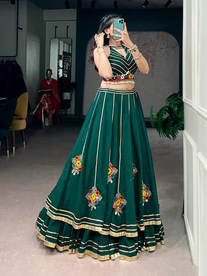 Lightweight fabric with vibrant Gamthi work, mirror detailing, Gotta Patti lace, and shell