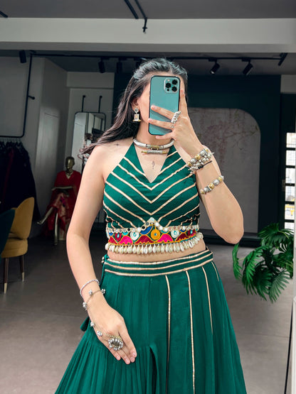 Lightweight fabric with vibrant Gamthi work, mirror detailing, Gotta Patti lace, and shell