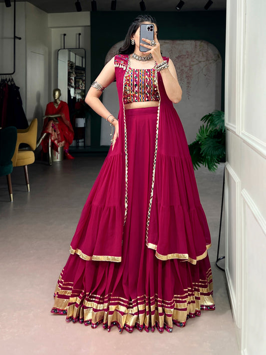 Raas Rani Collection Comfort with this lightweight lehenga, highlighted by a handcrafted Gamthi blouse, Gotta Patti lace detailing, and a mirror-adorned long koti. &nbsp;