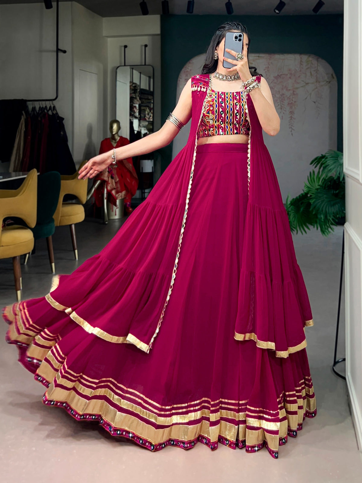 Raas Rani Collection Comfort with this lightweight lehenga, highlighted by a handcrafted Gamthi blouse, Gotta Patti lace detailing, and a mirror-adorned long koti. &nbsp;