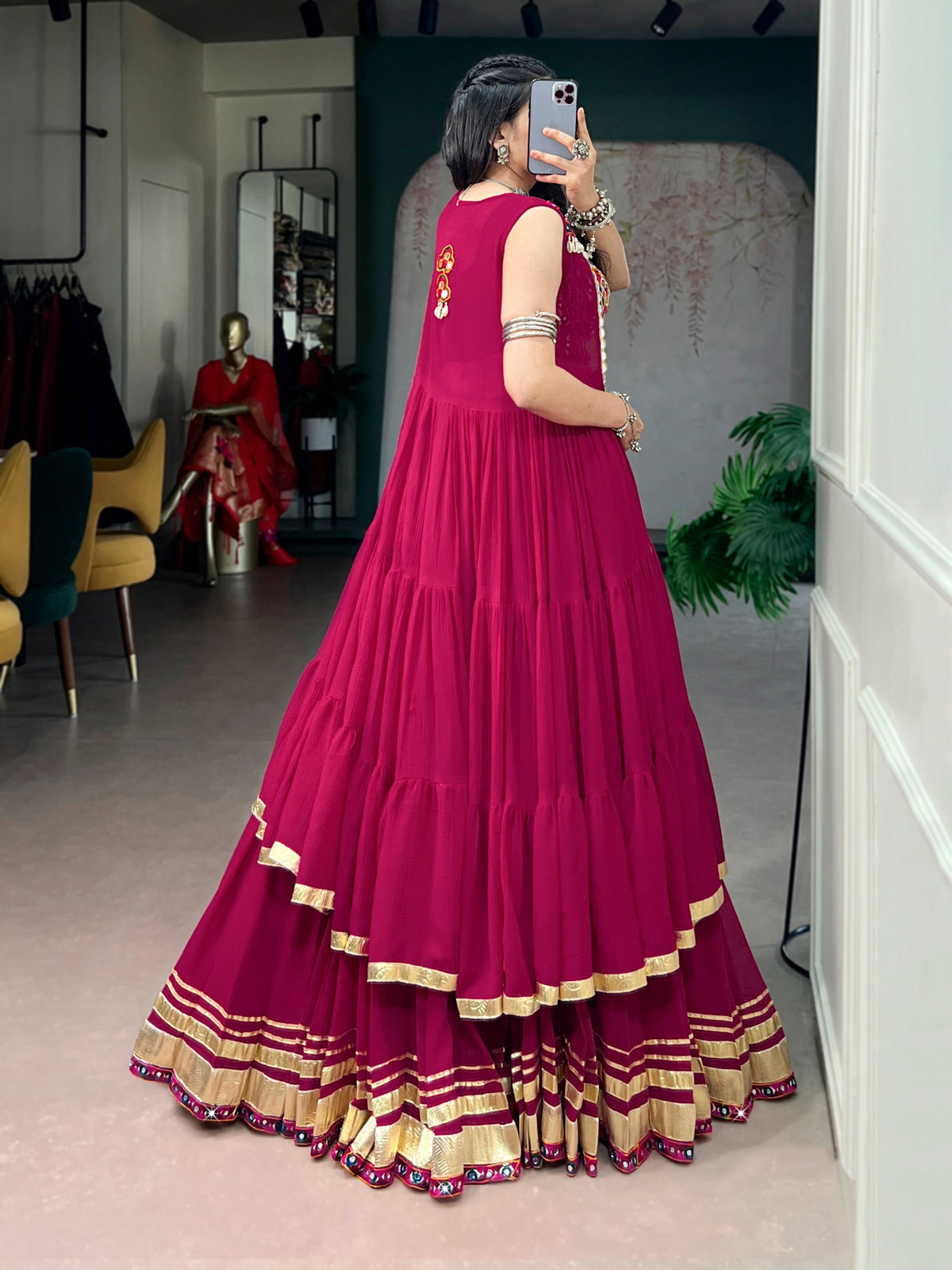 Raas Rani Collection Comfort with this lightweight lehenga, highlighted by a handcrafted Gamthi blouse, Gotta Patti lace detailing, and a mirror-adorned long koti. &nbsp;